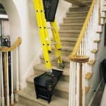 Ladder-Leveling-Tool being used on stairway