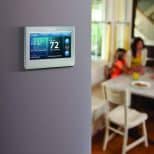 programmable-thermostaton wall at home