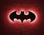 Batman LED Wall Light in red light hung on wall