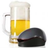 Portable-Automatic-Beer-Foamer next to jug of draft beer