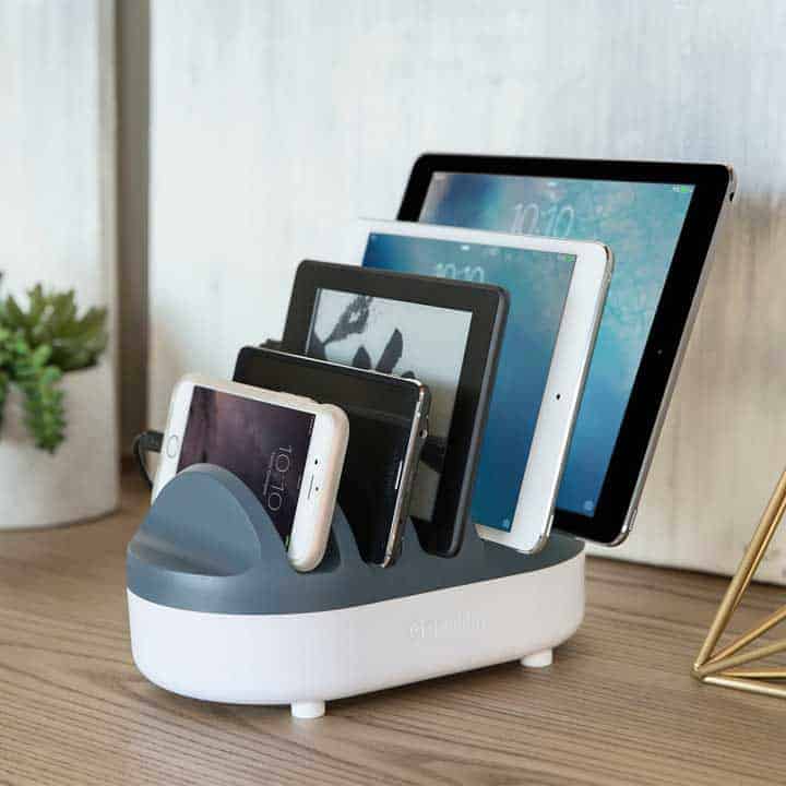 usb-charging-station with five devices on a table