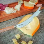 Cheese Knife Cutting Gouda Cheese